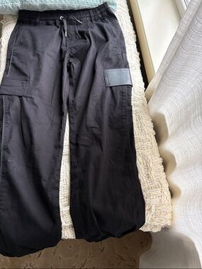 Kids black givenchy cargo pants  - Drawstring Waist they are a size 12 in kids